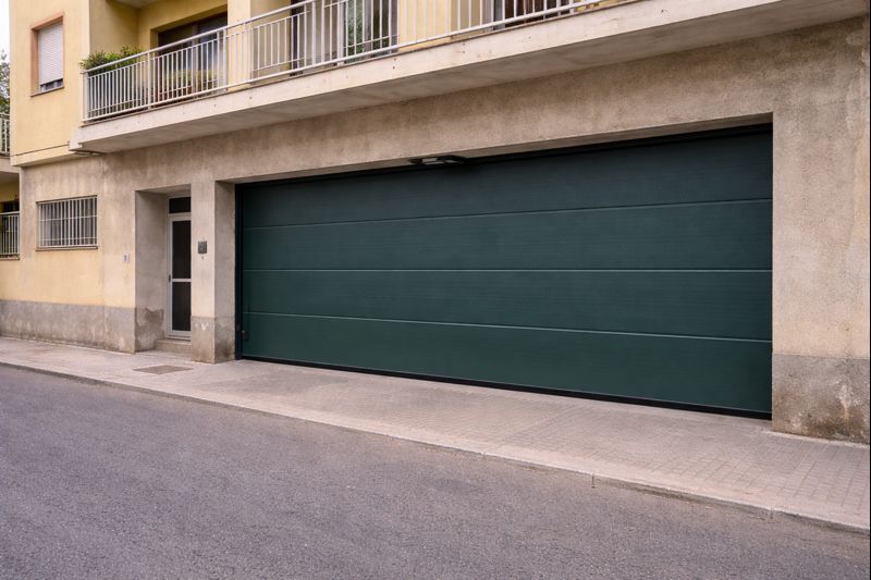 Reparación de puerta de garaje comunitaria en Gandia